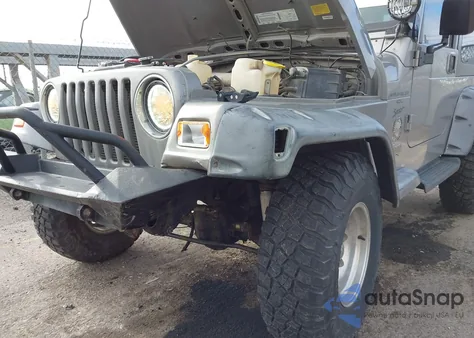 2000 Jeep Wrangler Sport z USA, uszkodzony, nr VIN 1J4FA49S2YP797321